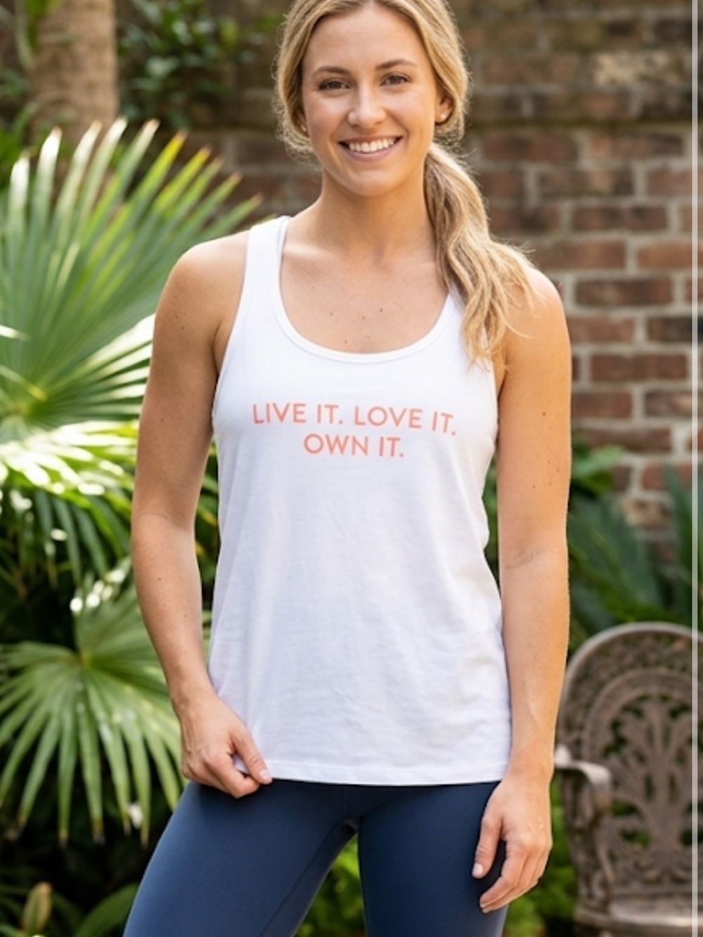 Under Armour “Live it Love it Own” it White Heatgear Loose Racerback Tank